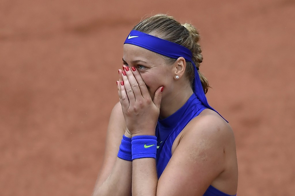 Kvitová marks competitive return with emotional win at French Open as top seed Kerber crashes out