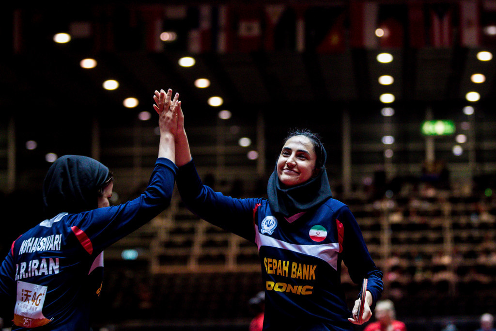 Neda Shahsavari and Maryam Samet of Iran celebrate mixed doubles success at the World Championships ©Getty Images