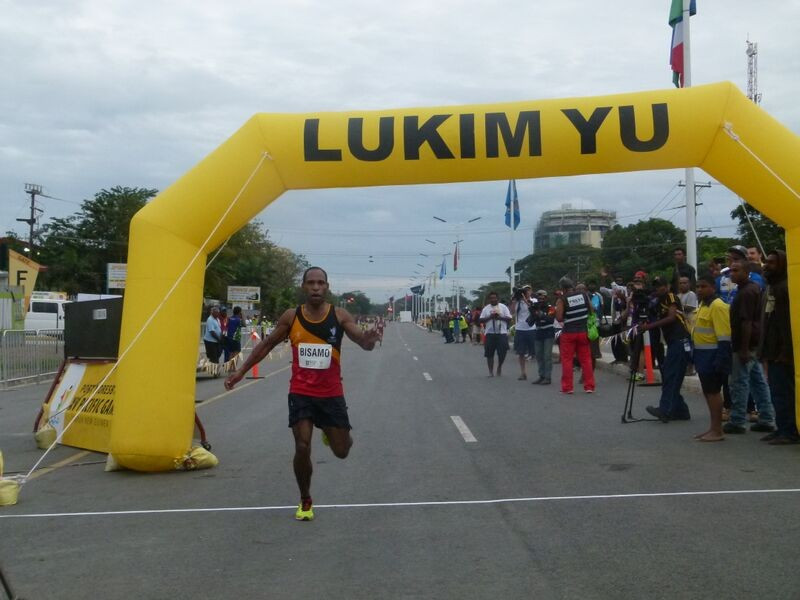 Kupsy Bisamo claimed victory in the men's half-marathon to begin another golden day for the host nation