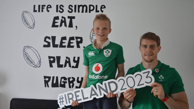 Ireland’s submission for the 2023 Rugby World Cup is due to be handed in tomorrow by 11-year-old rugby player and fan Alex Place, who is pictured here with Ulster and Ireland winger Andrew Trimble ©IRFU