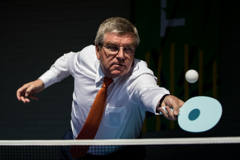 IOC President Thomas Bach played with a special wooden bat during a visit to the World Championships today ©Getty Images