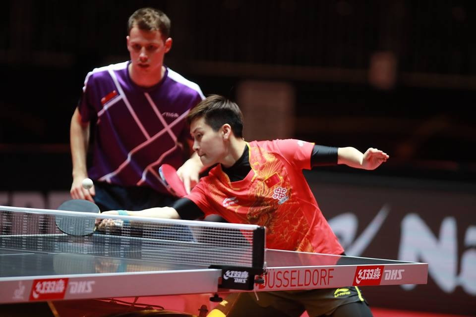 Feng Yalan of China, right, and Danish parnter Jonathan Groth were beaten by Hong Kong opponents in the mixed doubles today ©ITTF