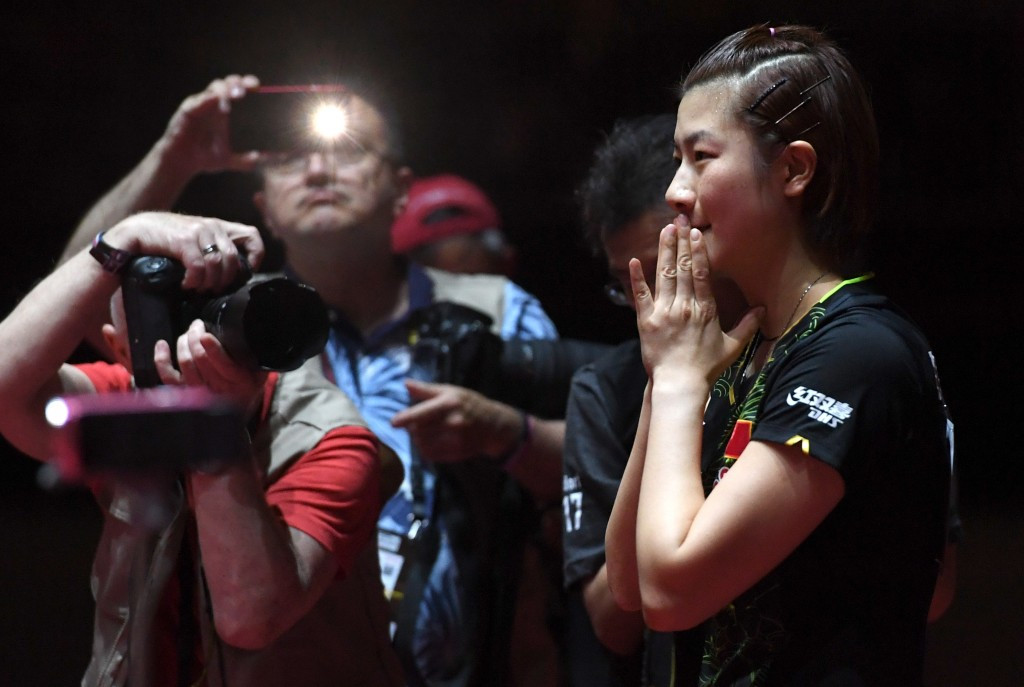 Ding Ning reacts after winning a third world singles title ©Getty Images