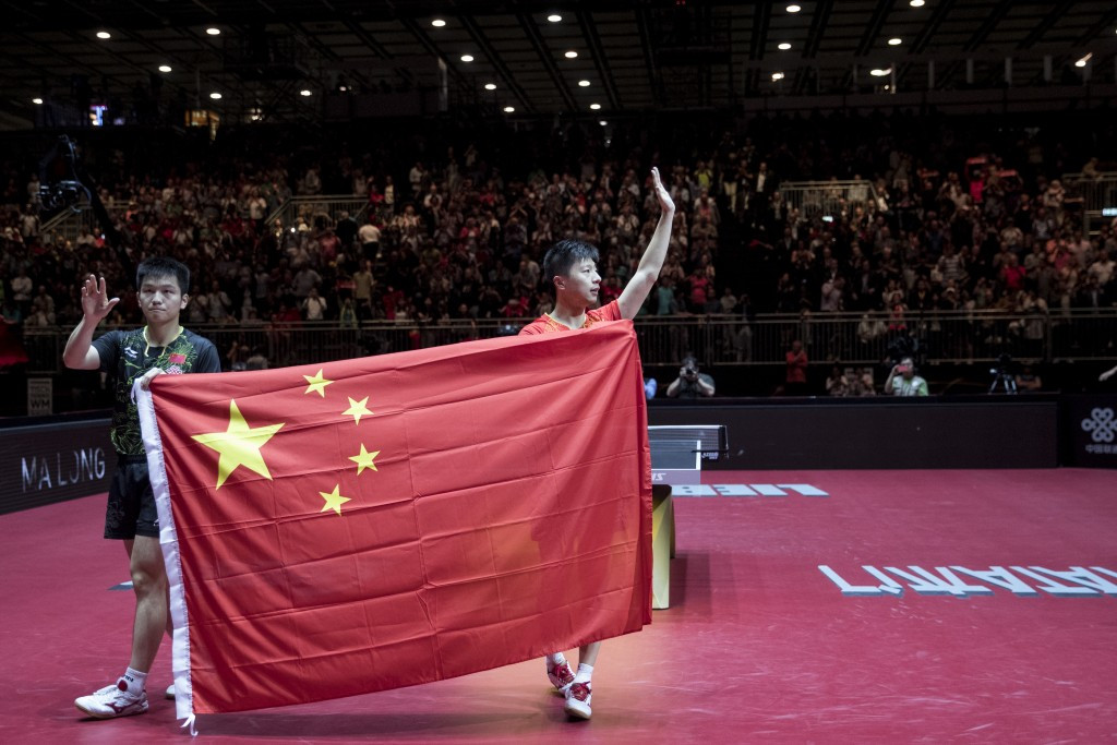 Fan Zhendong, left, and Ma Long pose after the men's singles final ©Getty Images