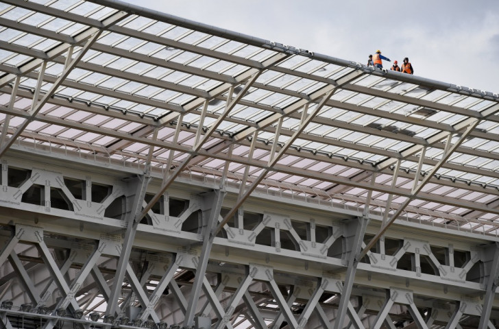 Renovation work in progress during March this year on the roof of the Luzhniki Stadium in Moscow, which will be re-configured within its original shell by the end of this year ahead of serving as one of the 12 stadiums for the 2018 World Cup finals ©Getty Images 