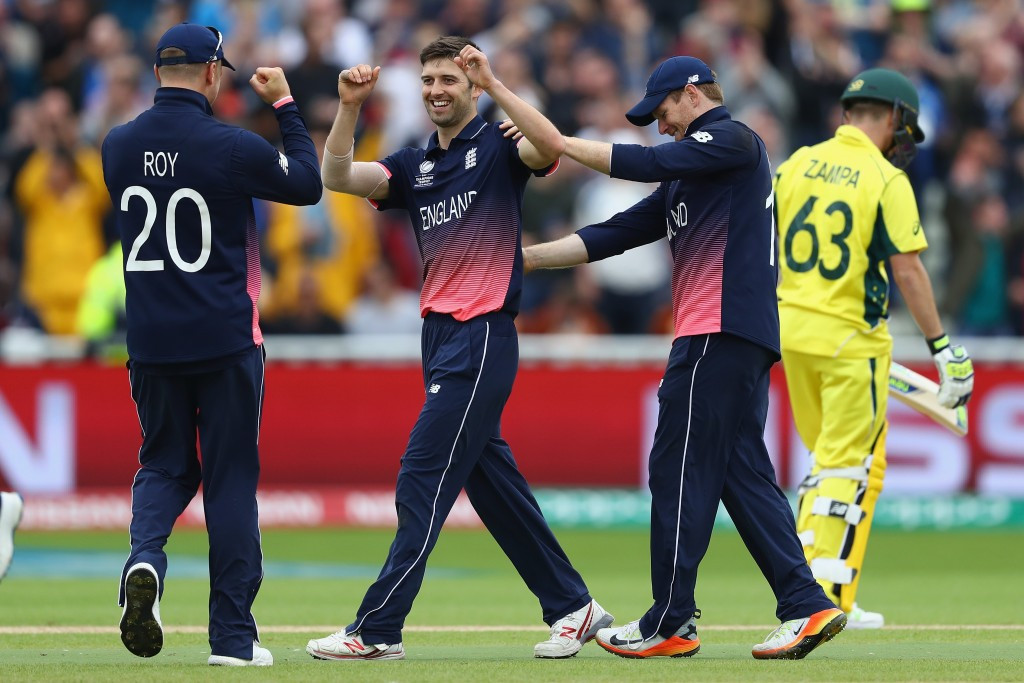 Mark Wood, centre, picked up four wickets during Australia's innings ©Getty Images