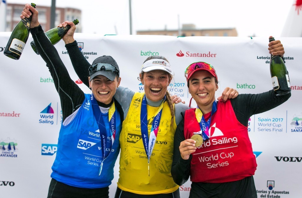 Evi van Acker, centre, eased to gold in the women's laser radial ©World Sailing