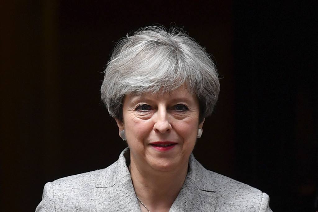 Cricket fan Theresa May had the equivalent of a testing innings with the bat during the General Election campaign ©Getty Images