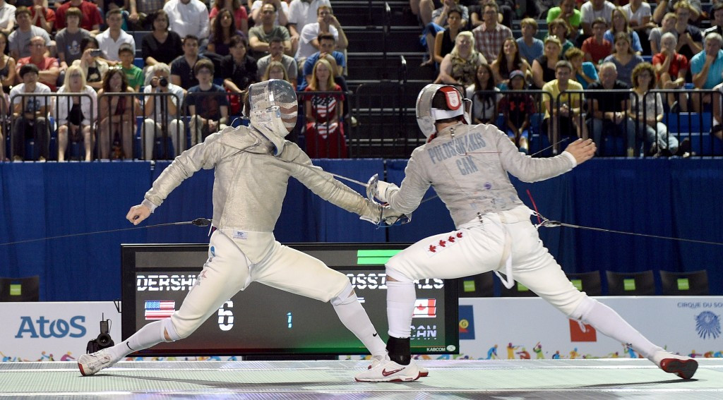 Gold medal winner Eli Dershwitz of the US (left) takes on Joseph Polossifakis of Canada during the men's sabre final ©Getty Images