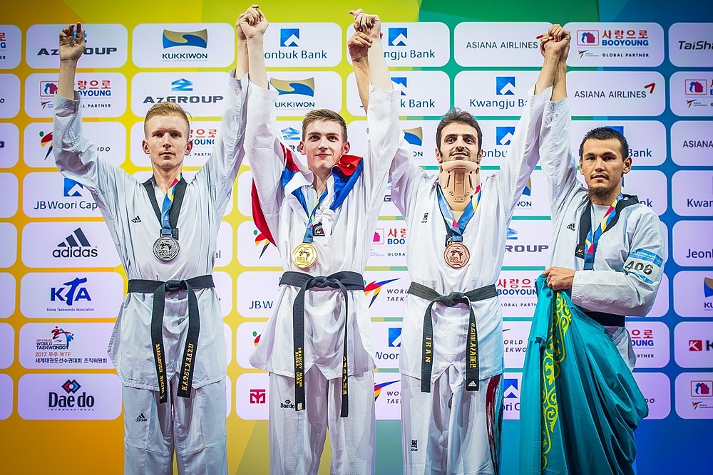 Hajizavareh was wearing a neck brace on the podium having won his quarter-final yesterday by virtue of the fact that his opponent, Seif Eissa of Egypt, was disqualified for an illegal kick to that part of the body ©World Taekwondo