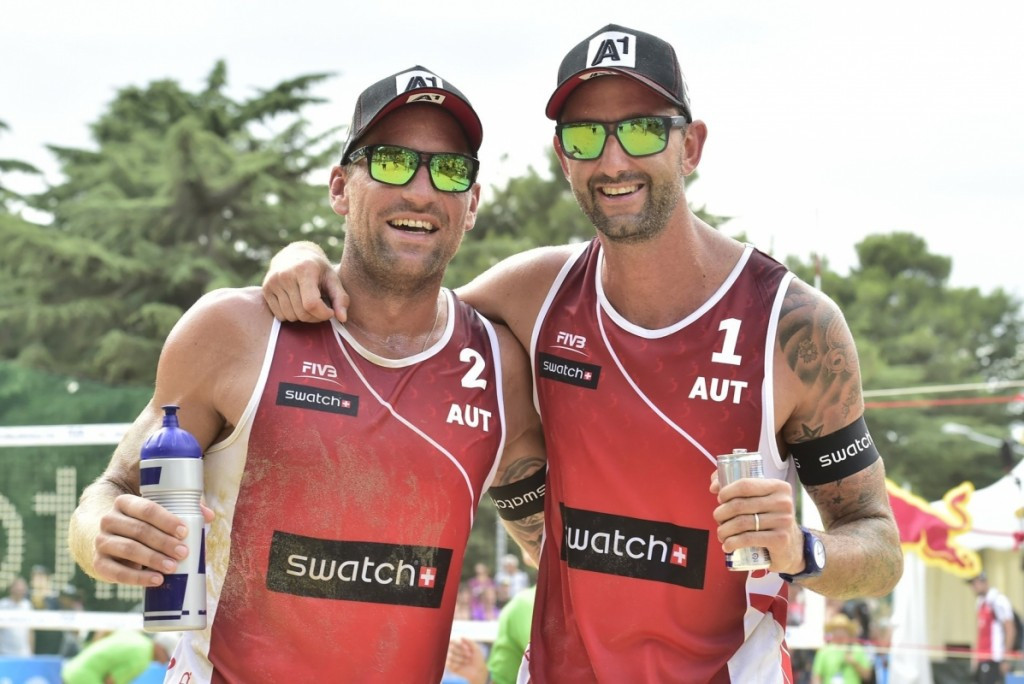 Clemens Doppler, right, and Alexander Horst, left, of Austria are through to round two in the men's event ©FIVB