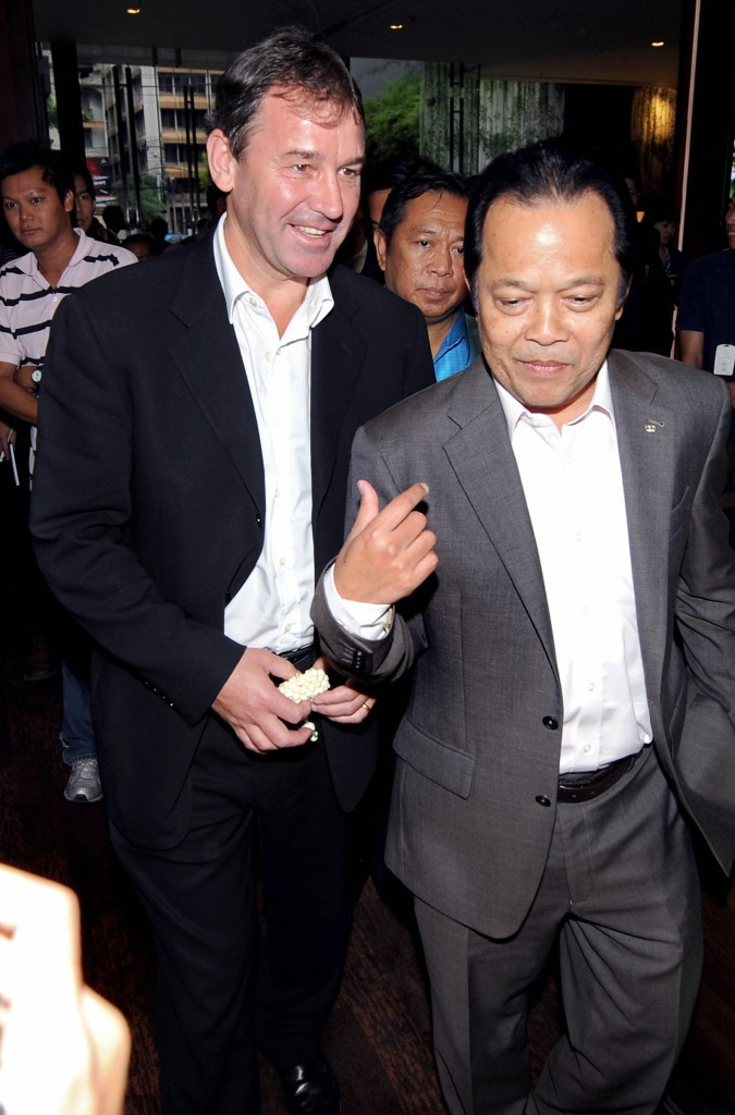 Worawi Makudi, pictured with former England and Manchester United captain Bryan Robson, survived several scandals during the 18 years he sat on FIFA's Executive Committee 