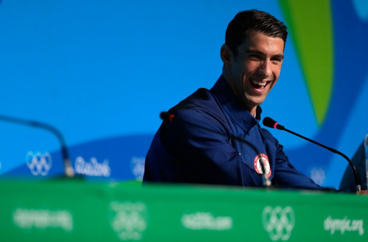 Michael Phelps, record Olympian, enjoying life at the Rio Olympics, indiscretions and comebacks all behind him ©Getty Images