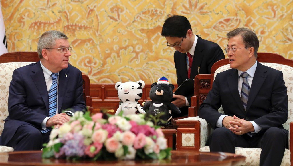 Thomas Bach, left, and Moon Jae-in, right, discussed North Korea's participation at Pyeongchang 2018 ©Getty Images