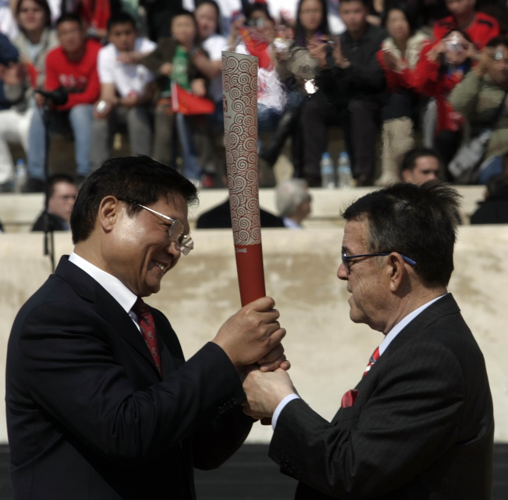 As President of the Hellenic Olympic Committee, Minos Kyriakou, right, played a leading role in the Olympic Torch Handover to Beijing in Athens in 2008 ©Getty Images