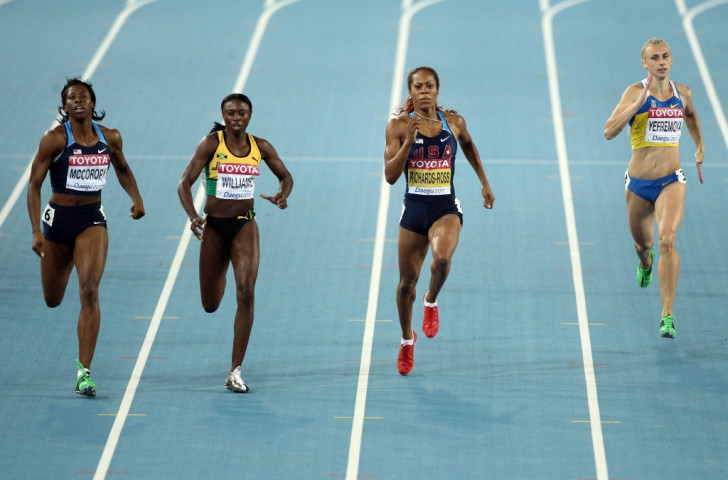 Shericka Williams, pictured second left in action during the 400m semi-finals at the 2011 IAAF World Championships, is  one of three Jamaicans seeking to run for Bahrain next year ©Getty Images