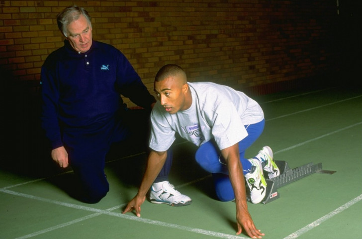 Malcolm Arnold pictured in 1992 with Colin Jackson, who won two world 110m hurdles titles and set a world record of 12.91sec in 1993 that was not beaten for almost 13 years ©Getty Images 