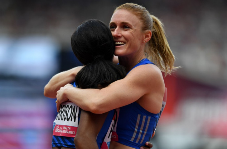 IAAF London Diamond League 100m hurdles winner Kendra Harrison is embraced by Australia's London 2012 champion Sally Pearson, who finished second in a season's best after a long struggle with injuries ©Getty Images