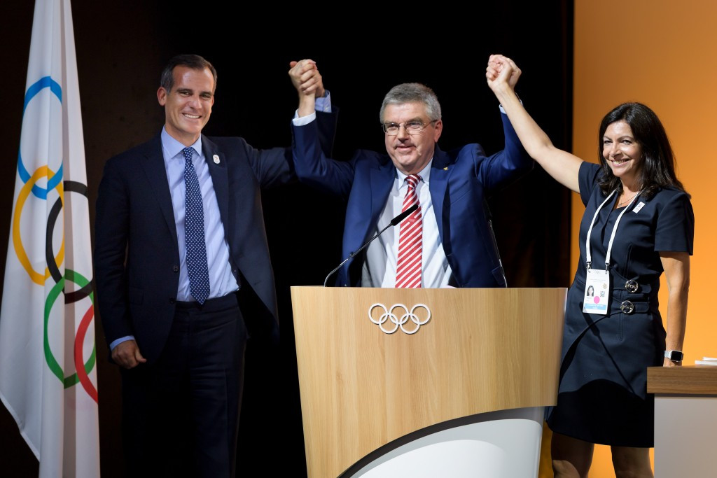IOC President Thomas Bach, centre, alongside Eric Garcetti and Anne Hidalgo ©Getty Images