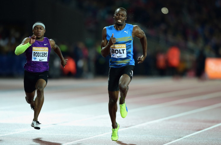 Usain Bolt finished ahead of American Michael Rodgers in the men's 100m final