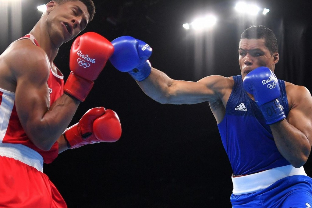 Joe Joyce, in blue, is one of two British Olympic boxers to have signed a deal with the promotional outfit partly headed by former world heavyweight champion David Haye ©Getty Images