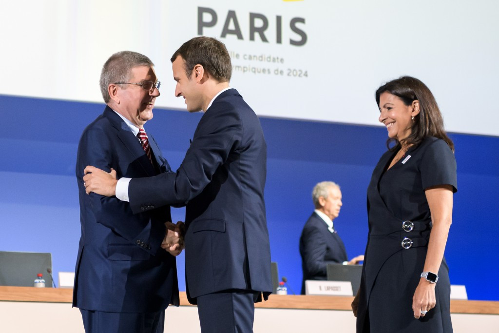Thomas Bach, left, with French President Emmanuel Macron, showed all his political skill during the discussions about the joint awarding of the 2024 and 2028 Olympic and Paralympic Games ©Getty Images