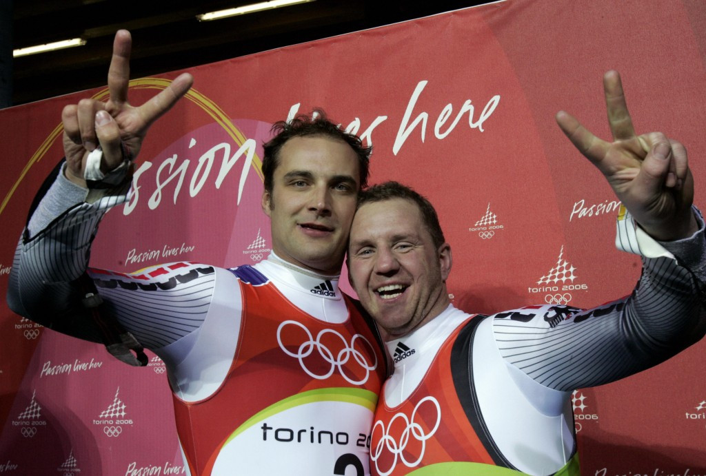 Andre Florschuetz, left, celebrating silver at Turin 2006 alongside Torsten Wustlich ©Getty Images