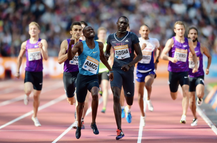 Botswana’s Nijel Amos beat Kenya's David Rudisha to the men's 800m crown in a reversal of the London 2012 Olympic final