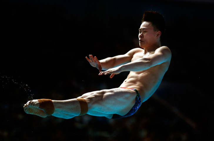 Xie Siyi won the men's 1m springboard crown as China continued their domination of the diving events