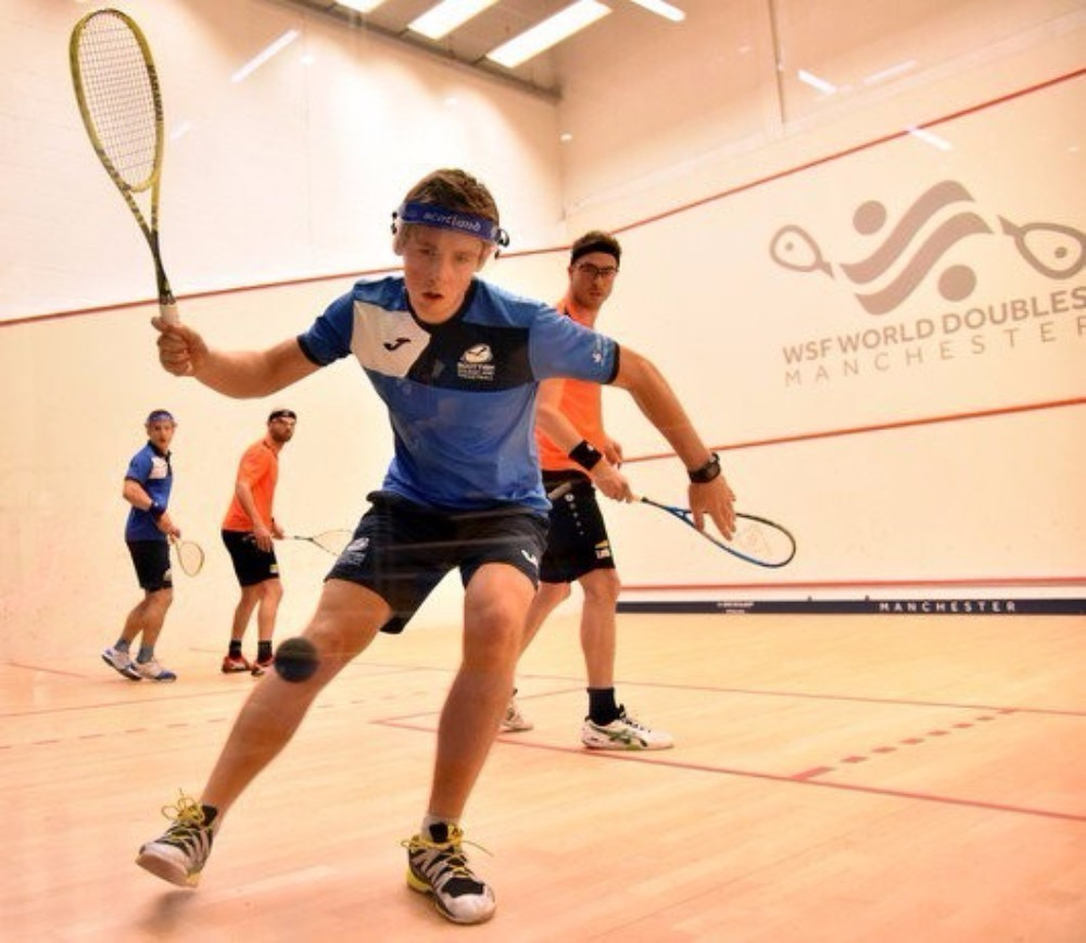 Defending men’s champions Alan Clyne and Greg Lobban reached the quarter-finals with three straight wins ©WSF