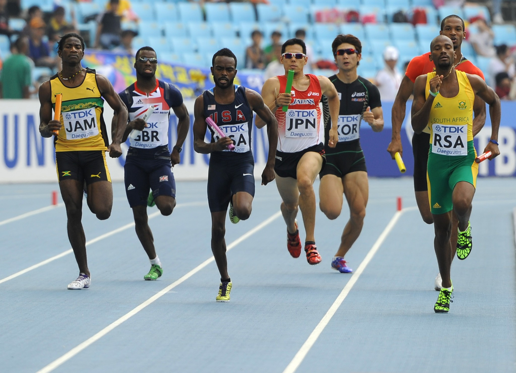 Riker Hylton, left, pictured running in the 4x400m relay at the 2011 World Championships in Daegu ©Getty Images