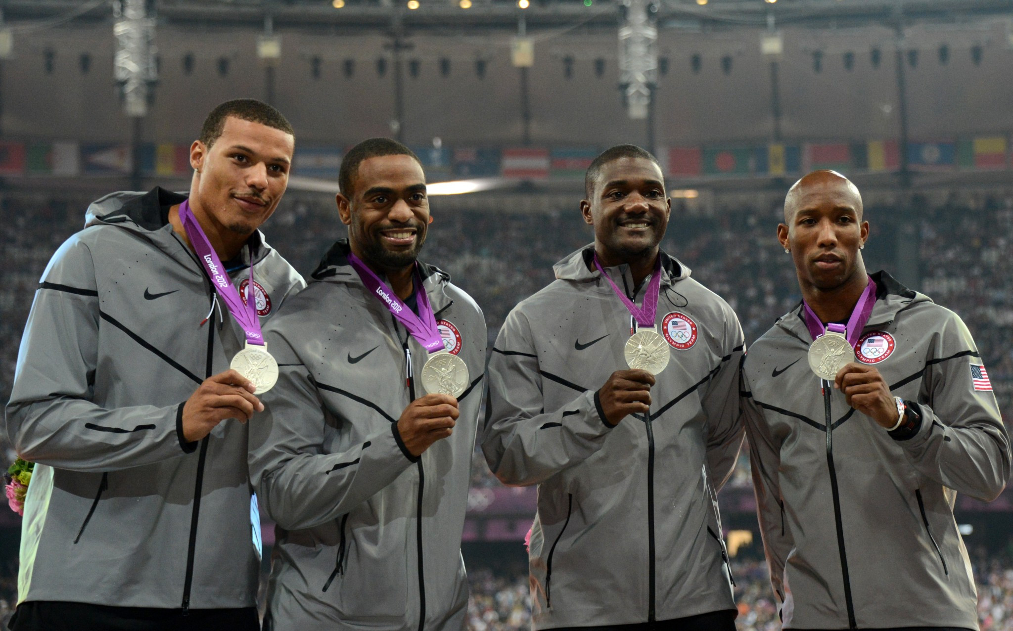 Ryan Bailey, left, was part of the United States' 4x100m relay team who won silver at London 2012 before Tyson Gay's, second left, failed drugs test in 2013 saw them disqualified ©Getty Images