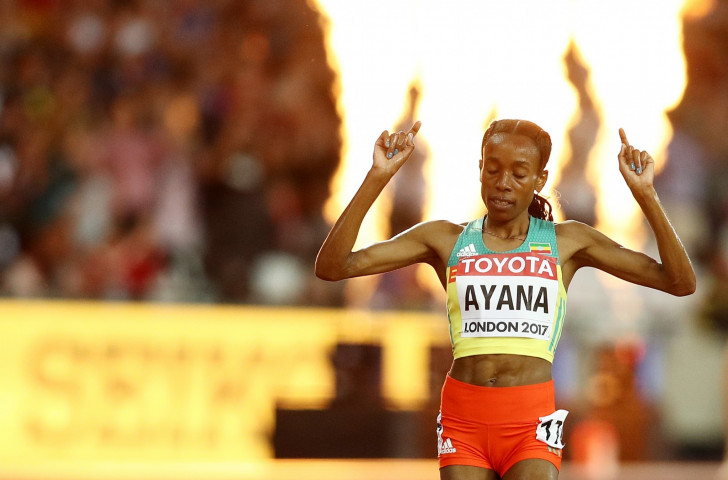 Ethiopia's Almaz Ayana salutes a huge win in the world 10,000m final in London ©Getty Images