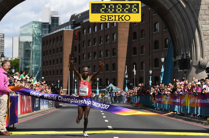 Kenya's Geoffrey Kirui claims the world marathon title on Tower Bridge on a historic day when the men's and women's races took place on the same day in London ©Getty Images