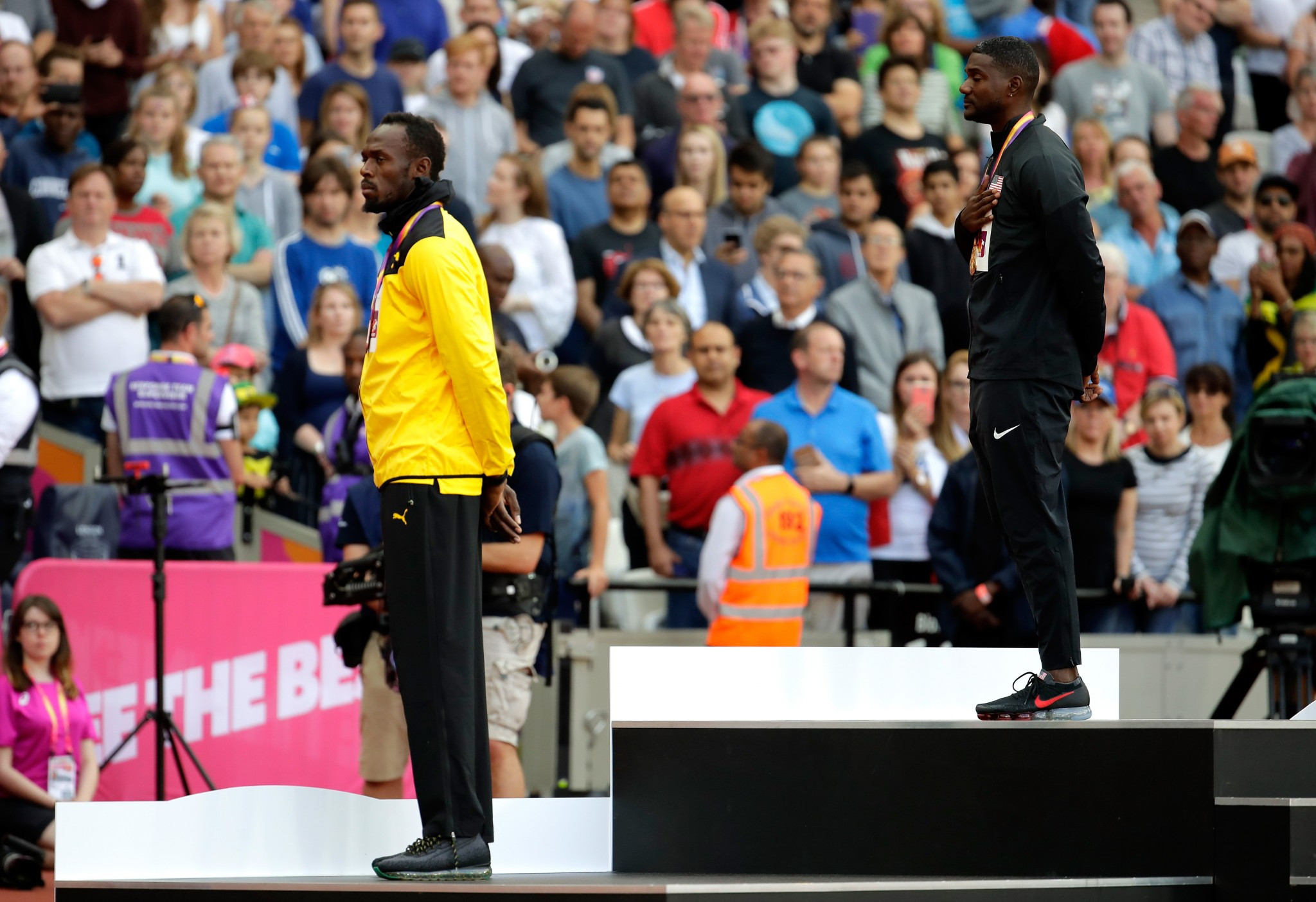 Justin Gatlin, centre, was booed when he was presented with his gold medal for victory in the 100 metres at the IAAF World Championships, with Usain Bolt, right, getting the bronze ©Getty Images
