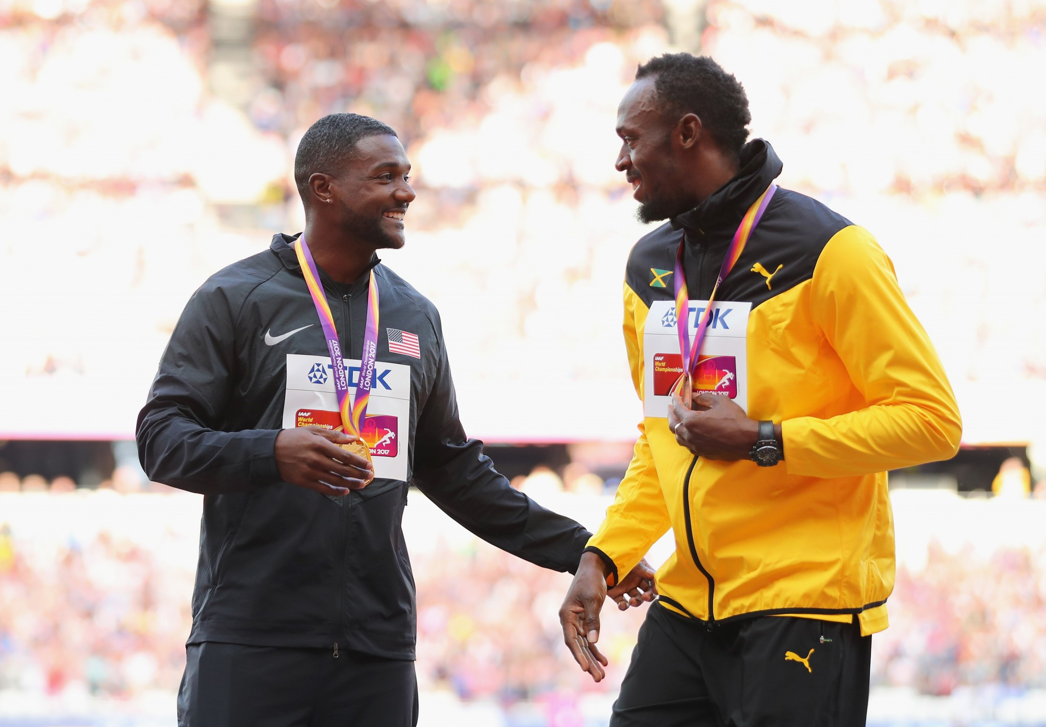 Justin Gatlin, left, gained a shock win over Christian Coleman and Usain Bolt, right ©Getty Images