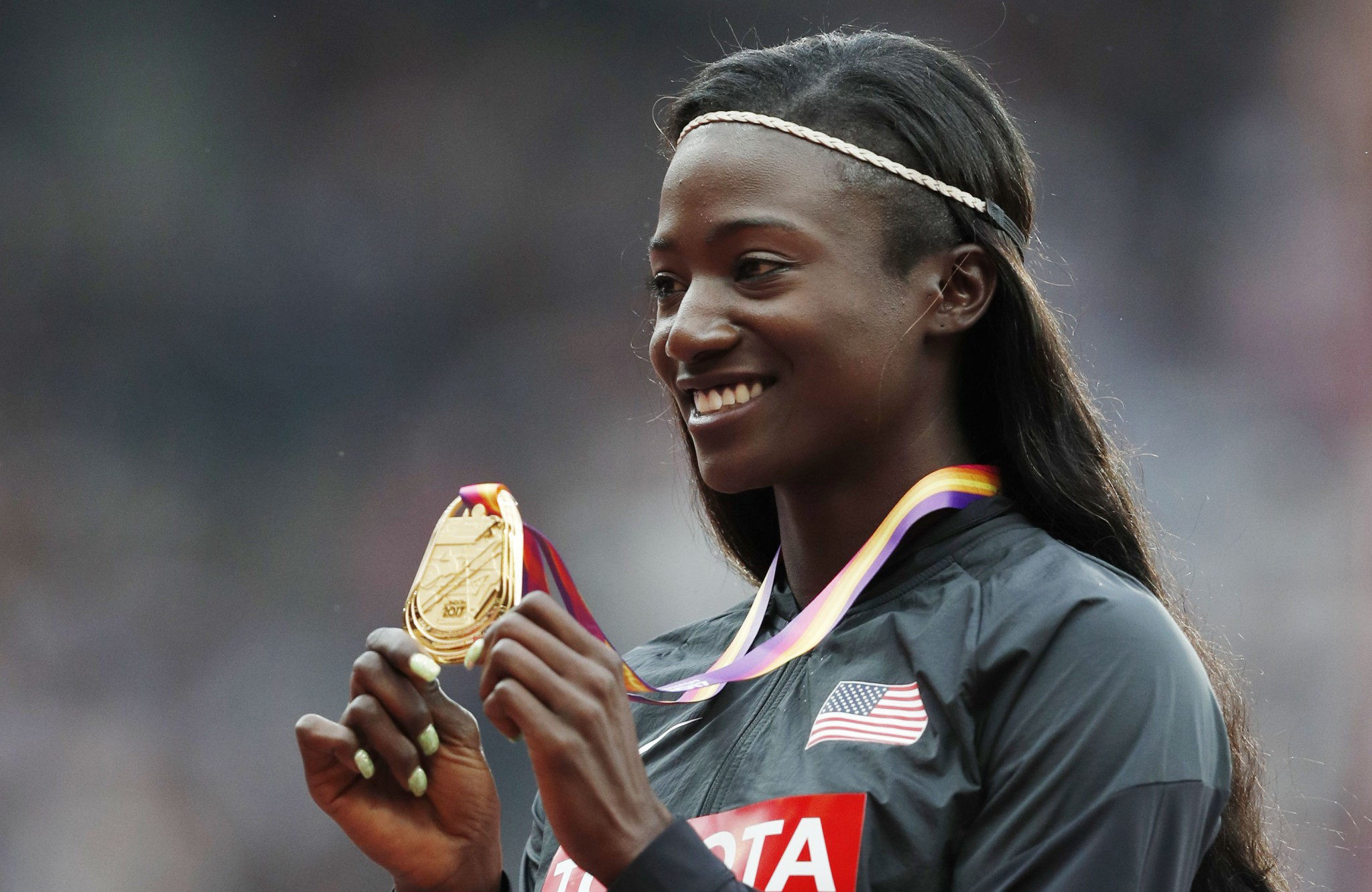 Tori Bowie of the United States was presented with her 100m gold medal before action got underway today ©Getty Images
