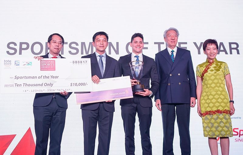 Swimmer Joseph Schooling and bowler New Hui Fen received the respective sportsman and sportswoman of the year prizes at the 2017 Singapore Sports Awards ©SNOC