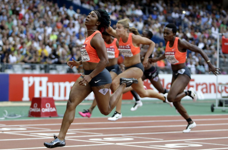 Jamaica's Shelly-Ann Fraser-Pryce, pictured winning the 100m at this month's Paris Diamond League meeting in 10.74sec - the fastest run this year - revealed today she may defend both her 100 and 200m world titles in Beijing next month ©Getty Images