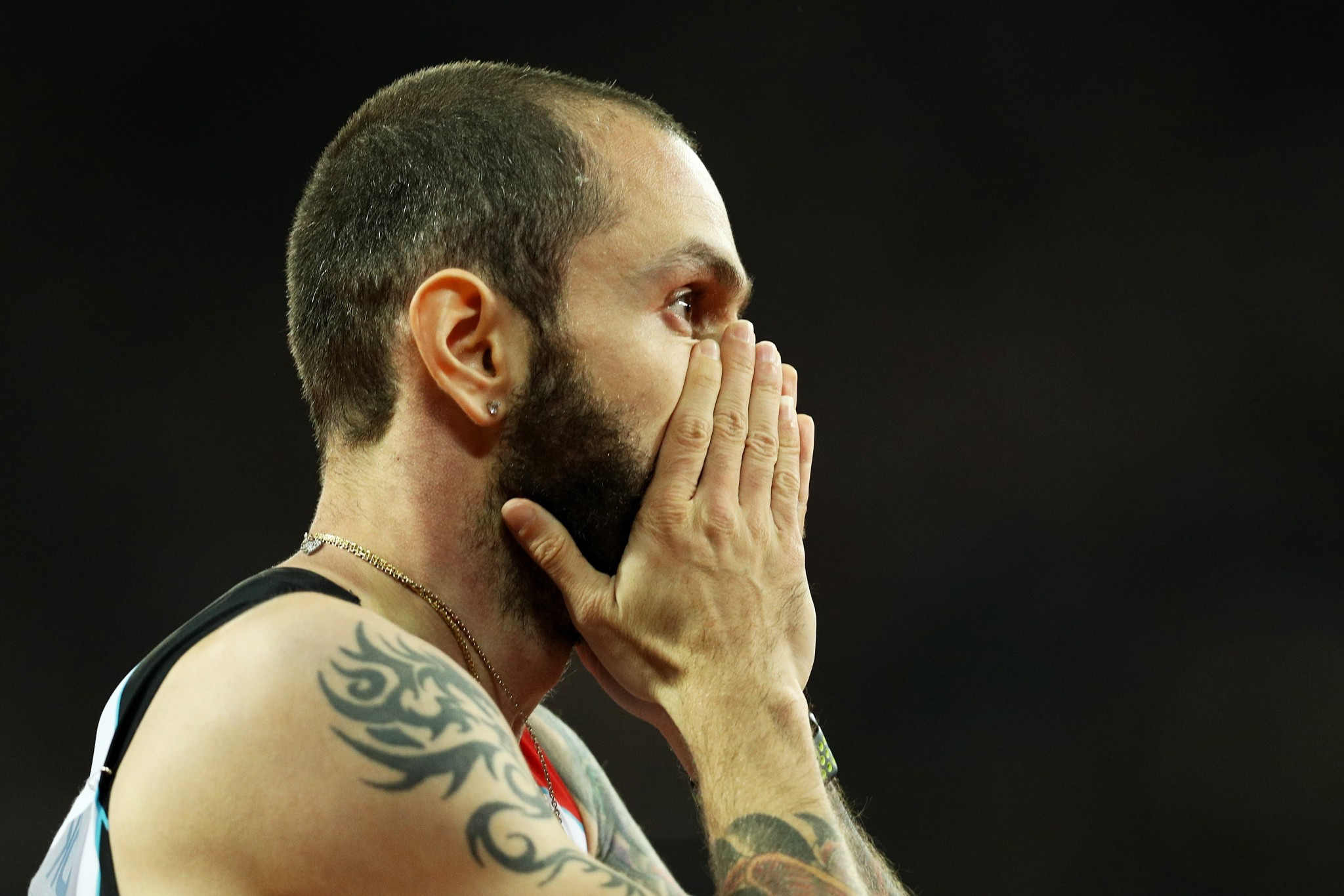 Ramil Guliyev holds his face in shock after his 200m victory ©Getty Images