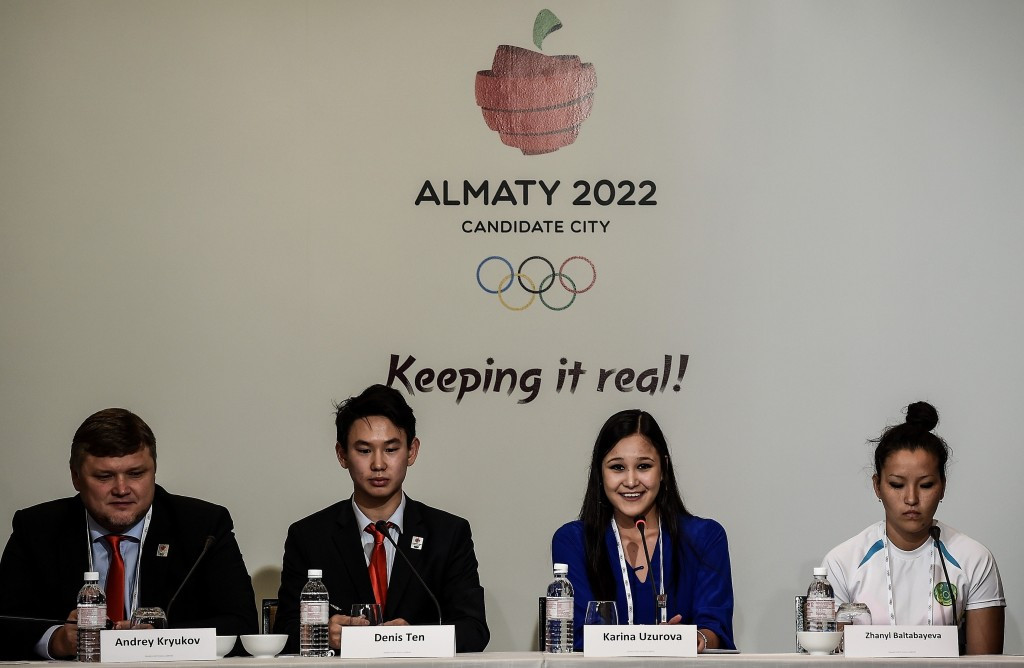 Almaty 2022 vice chairman Andrey Kryukov (left) also spoke alongside three Kazakhstan winter athletes about the bid today ©AFP/Getty Images
