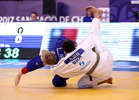 Germany's Marlene Galandi, blue, beat Brazil's Millena Silva, white, to take the under 70kg gold medal ©IJF