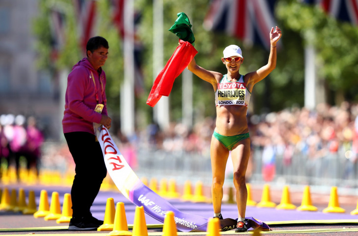 Portugal's Ines Henriques crosses the line in The Mall to win the first women's 50km race walk final at an IAAF World Championships, breaking her own world record in so doing ©Getty Images 