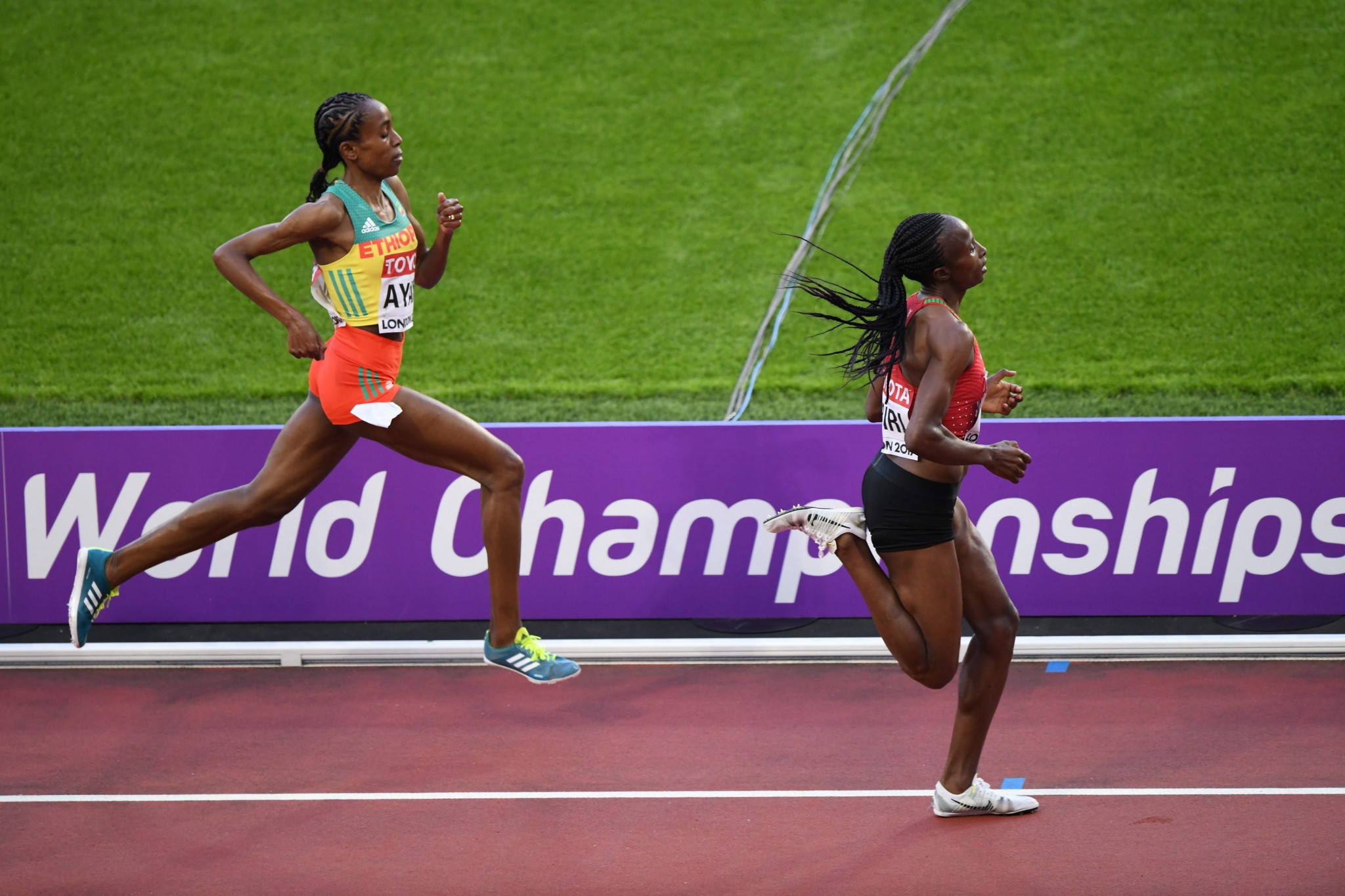 Hellen Obiri of Kenya outsprinted Almaz Ayana of Ethiopia to take gold in the women's 5,000m ©Getty Images