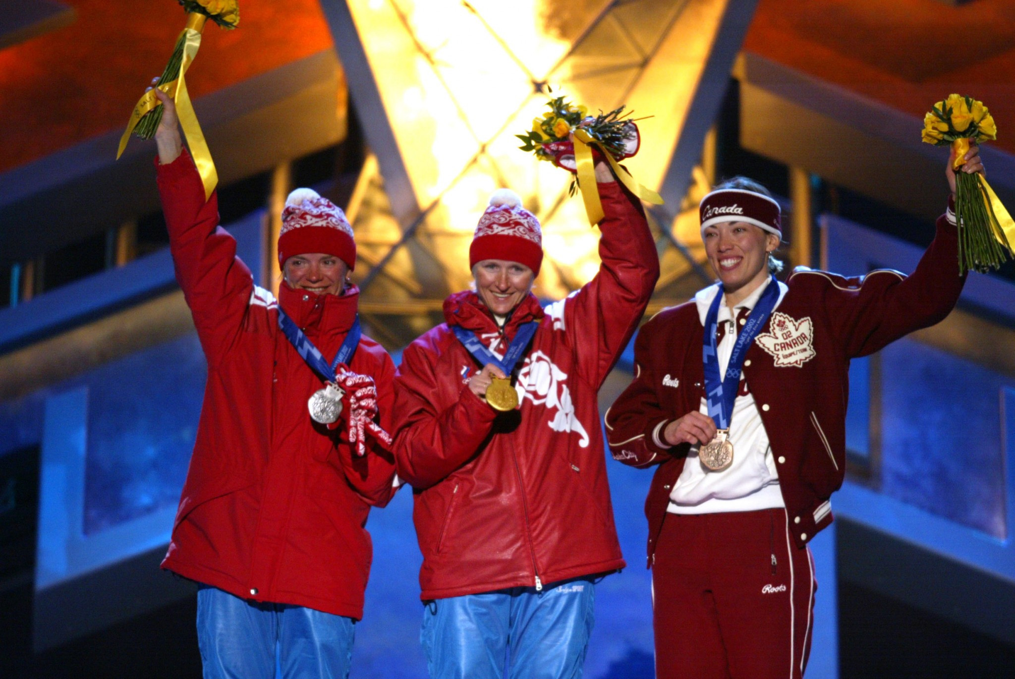 Canada's Beckie Scott, right, originally finished third at Salt Lake City 2002 before being upgraded after Russians Olga Danilova, centre, and Larissa Lazutina were each disqualified ©Getty Images