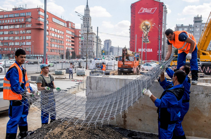 Workers involved in street renovation this month in downtown Moscow, as the city continues with preparations for next year's FIFA World Cup finals ©Getty Images 