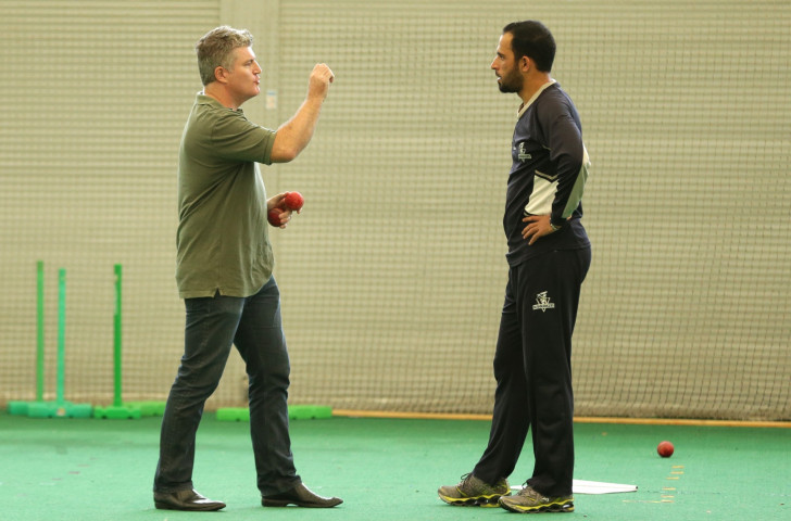 Former Australia cricket player Stuart MacGill  chats to former Pakistan bowler Fawad Ahmed at the Sydney Cricket Ground indoor nets ©Getty Images 