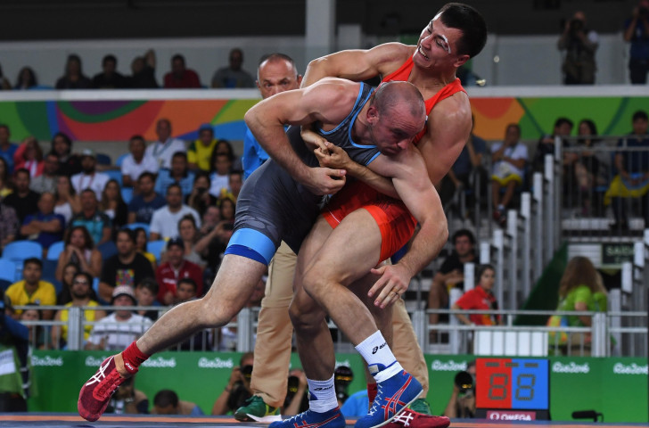 Russia's Roman Vlasov, right, will seek a world title at 80kg in Paris this coming week ©Getty Images