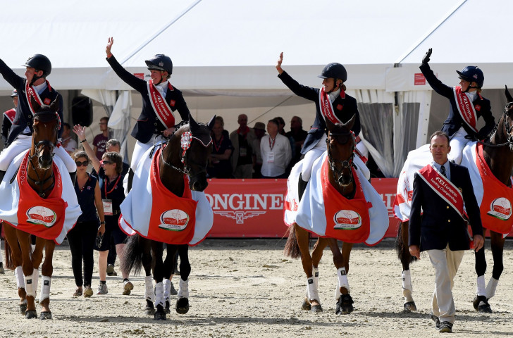 Britain's victorious team arrive at the medal ceremony presentation at the FEI European Eventing Championships ©Getty Images