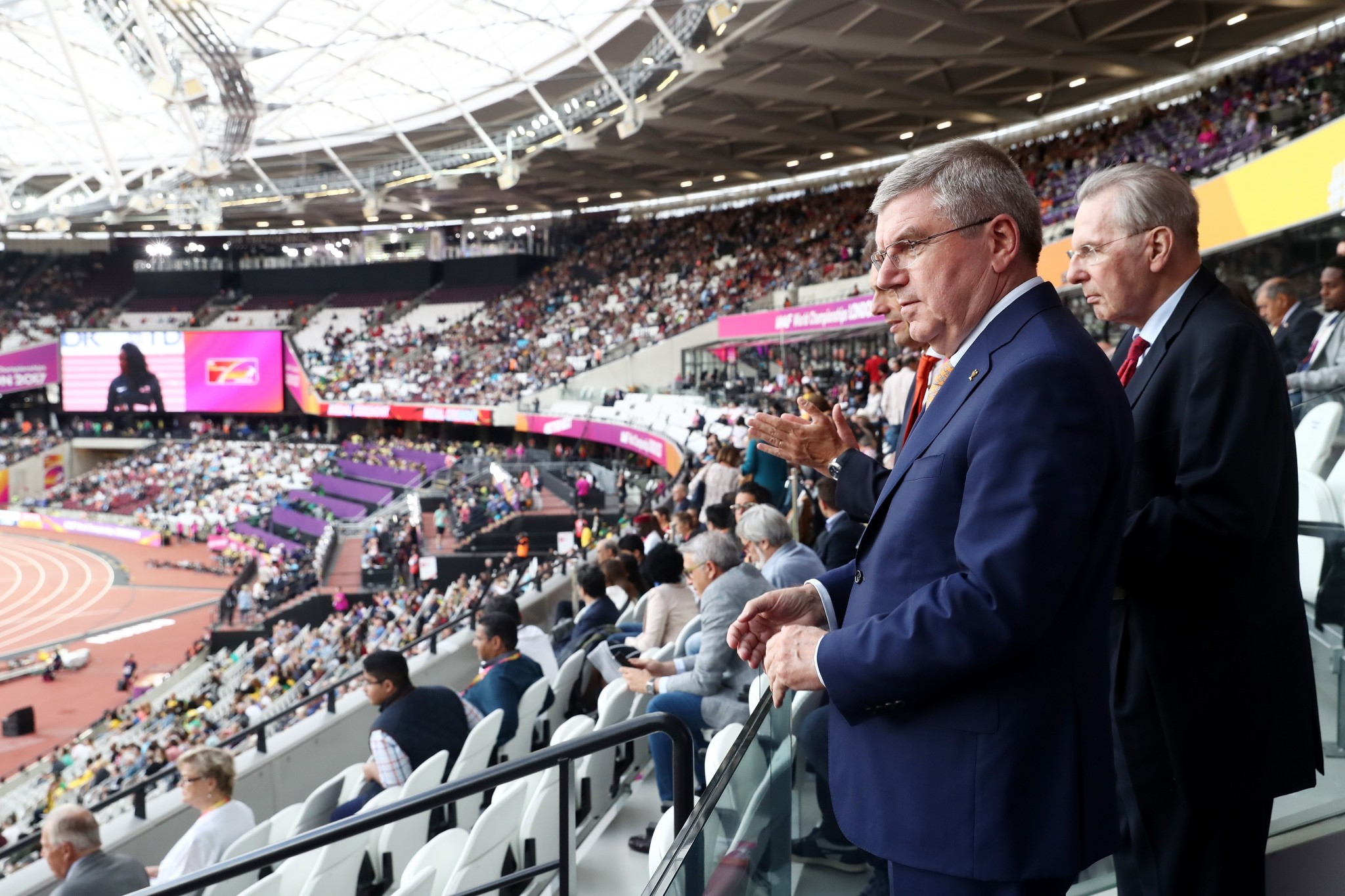 Past and present IOC Presidents Jacques Rogge, right, and Thomas Bach, watch the World Athletics Championships in London ©Getty Images